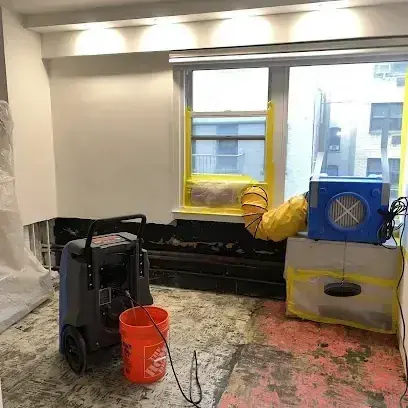Drying equipment running in an opened room, a typical setup in Mukilteo homes