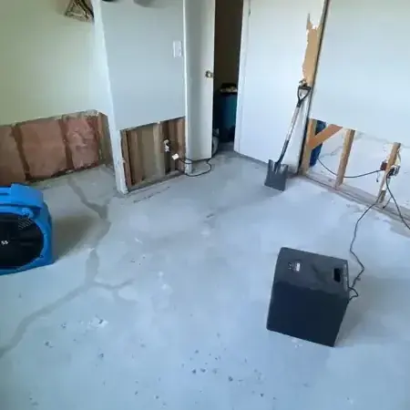 Drying equipment set up inside a room during a water damage job